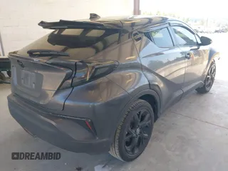 2021 Toyota C-HR LE with VIN JTNKHMBX5M1129253, listed as a IAAI auction lot 42169707 with 54,312 mi miles and . Bid and sale history available at DreamBid. Image 4.