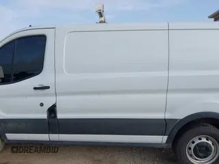 2020 Ford Transit Cargo z VIN 1FTYE1Y82LKB45974, wystawiony jako IAAI lot #42614744 z przebiegiem 200 241 mil mil oraz . Historia ofert i sprzedaży dostępna na DreamBid. Obrazek 14.