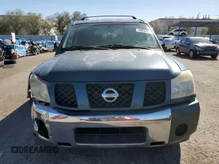 2005 Nissan Armada LE z VIN 5N1AA08A05N710696, wystawiony jako Copart lot #46854495 z przebiegiem 211 883 mil mil oraz Szkoda całkowita • Salvage title. Historia ofert i sprzedaży dostępna na DreamBid. Obrazek 5.