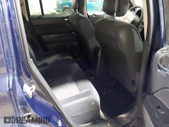 2014 Jeep Patriot Sport with VIN 1C4NJPBA1ED553340, listed as a IAAI auction lot 41212383 with 119,819 mi miles and . Bid and sale history available at DreamBid. Image 8.