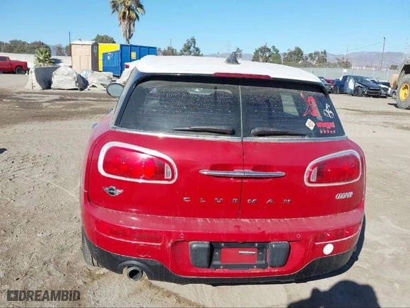 2016 MINI Cooper Clubman with VIN WMWLN5C51G2E30234, listed as a IAAI auction lot 41408299 with 81,895 mi miles. Bid and sale history available at carsss.com. Image 16.