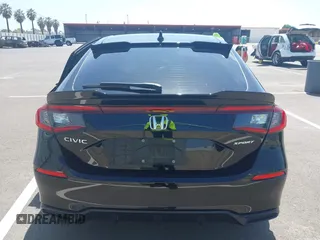 2023 Honda Civic Sport with VIN 19XFL2H84PE001354, listed as a IAAI auction lot 42053691 with 34,127 mi miles and . Bid and sale history available at DreamBid. Image 16.