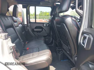 2021 Jeep Wrangler Unlimited Rubicon with VIN 1C4HJXFN3MW816375, listed as a IAAI auction lot 42480514 with 62,324 mi miles and . Bid and sale history available at DreamBid. Image 8.