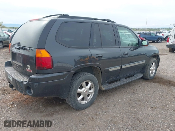 2003 GMC Envoy SLT with VIN 1GKDT13S632197541, listed as a IAAI auction lot 42178695 with 221,189 mi miles and . Bid and sale history available at DreamBid. Image 4.