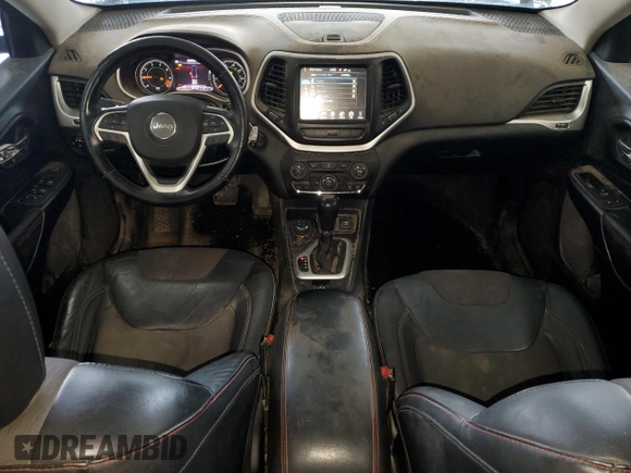 2014 Jeep Cherokee Trailhawk z VIN 1C4PJMBB0EW309277, wystawiony jako Copart lot #52370565 z przebiegiem 148 924 mil mil oraz Czysty tytuł • Clean title. Historia ofert i sprzedaży dostępna na DreamBid. Obrazek 8.
