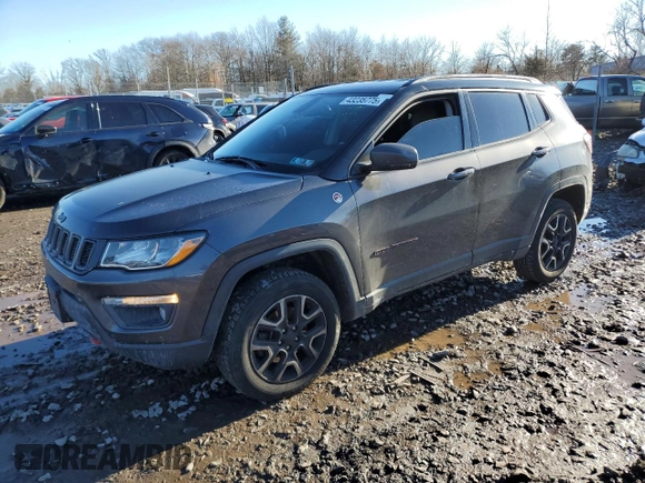 2019 Jeep Compass Trailhawk with VIN 3C4NJDDB5KT775860, listed as a Copart auction lot 48113695 with 76,091 mi miles and Salvage Title. Bid and sale history available at DreamBid. Image 1.