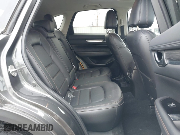 2020 Mazda CX-5 Grand Touring with VIN JM3KFBDM4L0829861, listed as a IAAI auction lot 41826250 with 62,091 mi miles and . Bid and sale history available at carsss.com. Image 8.