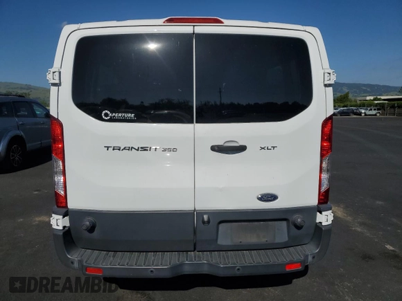 2018 Ford Transit Passenger XL z VIN 1FBZX2YM8JKA97299, wystawiony jako Copart lot #53553115 z przebiegiem 101 532 mil mil oraz Szkoda całkowita • Salvage title. Historia ofert i sprzedaży dostępna na DreamBid. Obrazek 6.