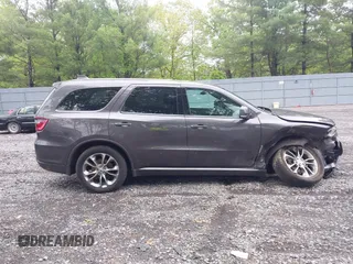 2019 Dodge Durango GT Plus z VIN 1C4RDJDG6KC770441, wystawiony jako IAAI lot #42275509 z przebiegiem 121 254 mil mil oraz . Historia ofert i sprzedaży dostępna na DreamBid. Obrazek 13.
