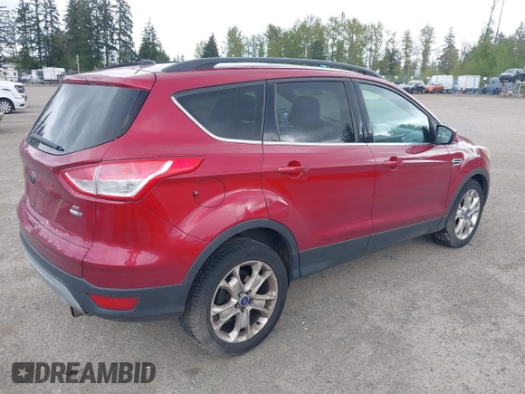 2013 Ford Escape SE with VIN 1FMCU9GXXDUB73916, listed as a IAAI auction lot 42086263 with 176,226 mi miles and . Bid and sale history available at DreamBid. Image 4.
