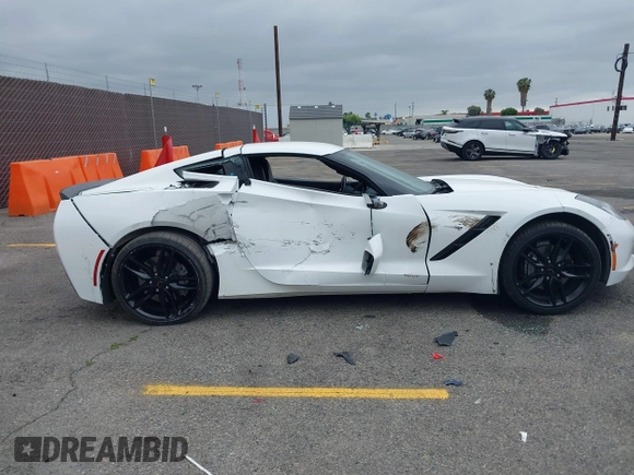 2019 Chevrolet Corvette 1LT z VIN 1G1YB2D76K5112204, wystawiony jako IAAI lot #42215657 z przebiegiem Nie podano mil oraz . Historia ofert i sprzedaży dostępna na DreamBid. Obrazek 13.