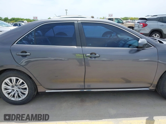 2014 Toyota Camry L with VIN 4T4BF1FKXER379158, listed as a IAAI auction lot 42050926 with 88,060 mi miles and . Bid and sale history available at DreamBid. Image 13.