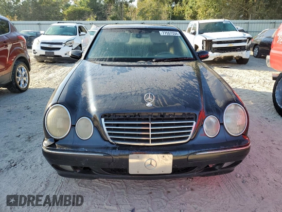 2002 Mercedes-Benz E-Class with VIN WDBJF65J32B494321, listed as a Copart auction lot 77557334 with 198,820 mi miles and Salvage Title. Bid and sale history available at carsss.com. Image 5.