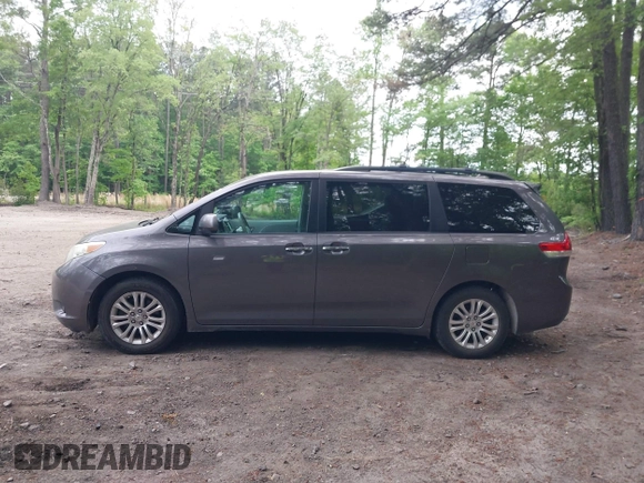 2011 Toyota Sienna XLE AAS with VIN 5TDYK3DC8BS016319, listed as a IAAI auction lot 42186294 with 293,401 mi miles and . Bid and sale history available at DreamBid. Image 14.