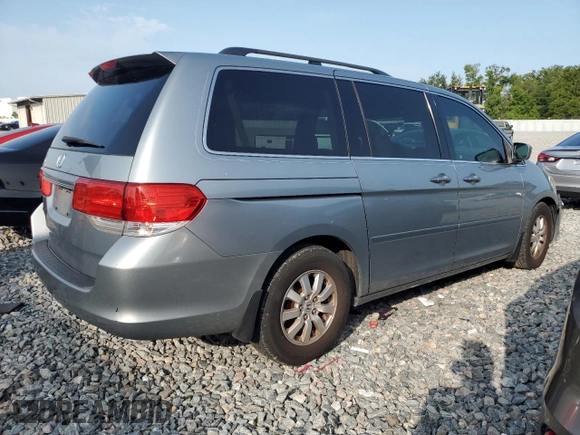 2010 Honda Odyssey EX-L с VIN 5FNRL3H61AB085345, выставлен на аукционе Copart как лот 58301415 с пробегом 151 428 миль миль и Списание • Salvage title. История ставок и продаж доступна на DreamBid. Изображение 3.