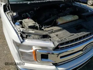 2018 Ford F-150 XL z VIN 1FTEW1EP0JFE63917, wystawiony jako Copart lot #70759905 z przebiegiem 76 266 mil mil oraz Szkoda całkowita • Salvage title. Historia ofert i sprzedaży dostępna na DreamBid. Obrazek 13.