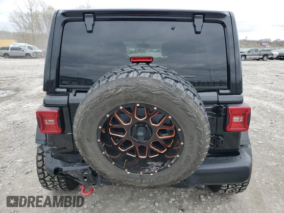 2018 Jeep Wrangler Unlimited Rubicon with VIN 1C4HJXFG4JW266438, listed as a Copart auction lot 50940075 with 75,175 mi miles and Salvage title. Bid and sale history available at DreamBid. Image 6.