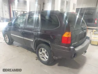 2008 GMC Envoy SLE2 with VIN 1GKDS13S682121604, listed as a IAAI auction lot 41613380 with 166,512 mi miles. Bid and sale history available at carsss.com. Image 3.