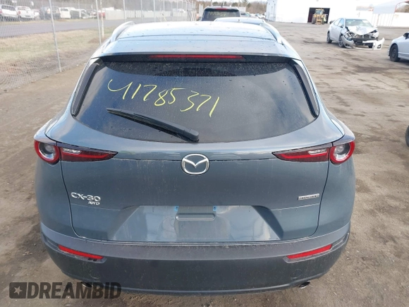 2023 Mazda CX-30 S Carbon Edition with VIN 3MVDMBCM1PM573317, listed as a IAAI auction lot 41785371 with 6,475 mi miles and . Bid and sale history available at DreamBid. Image 16.