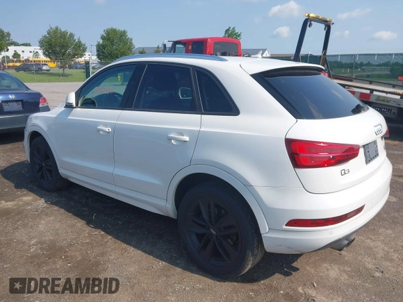 2017 Audi Q3 Premium z VIN WA1ECCFS7HR009402, wystawiony jako IAAI lot #42462248 z przebiegiem 46 536 mil mil oraz . Historia ofert i sprzedaży dostępna na DreamBid. Obrazek 3.