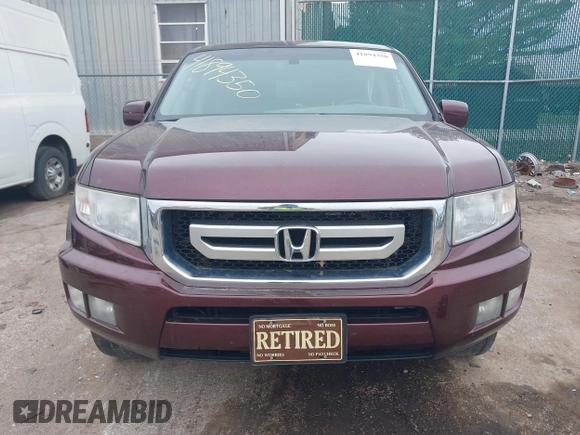 2011 Honda Ridgeline RTL with VIN 5FPYK1F51BB007959, listed as a IAAI auction lot 41894350 with 186,926 mi miles. Bid and sale history available at carsss.com. Image 12.