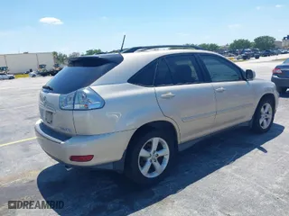 2005 Lexus RX 330 with VIN 2T2HA31U05C059173, listed as a IAAI auction lot 42039940 with 165,393 mi miles. Bid and sale history available at carsss.com. Image 4.
