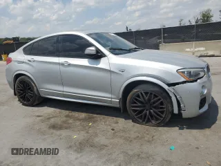 2018 BMW X4 M40i z VIN 5UXXW7C55J0W63724, wystawiony jako Copart lot #55757755 z przebiegiem 149 480 mil mil oraz Tytuł czysty. Historia ofert i sprzedaży dostępna na DreamBid. Obrazek 4.