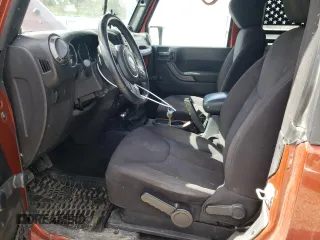 2014 Jeep Wrangler Sport with VIN 1C4AJWAG0EL184815, listed as a Copart auction lot 50307365 with 139,921 mi miles and Salvage title. Bid and sale history available at DreamBid. Image 7.