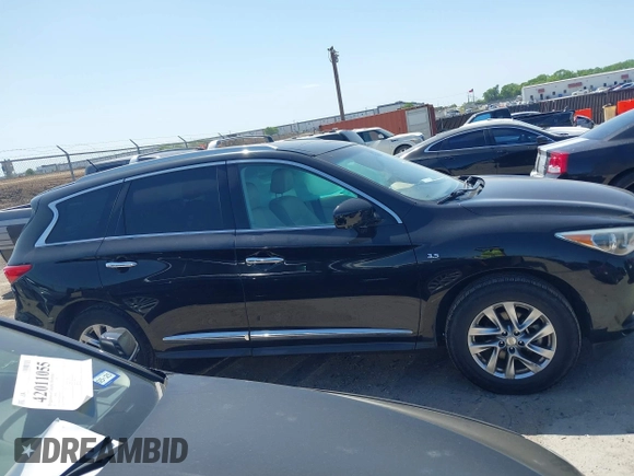 2015 Infiniti QX60 with VIN 5N1AL0MNXFC544896, listed as a IAAI auction lot 42009914 with 102,815 mi miles and . Bid and sale history available at DreamBid. Image 13.
