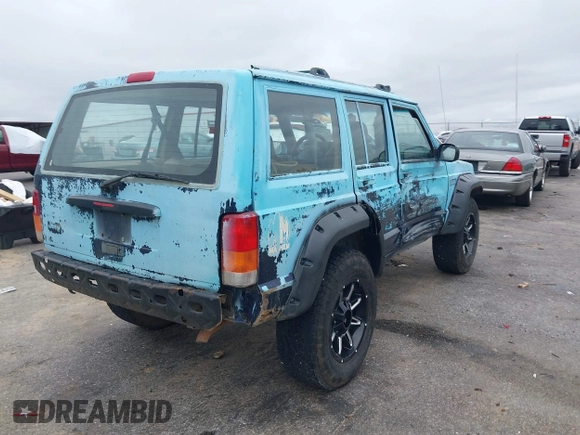 1997 Jeep Cherokee SE z VIN 1J4FJ28S3VL573144, wystawiony jako IAAI lot #41965201 z przebiegiem 298 276 mil mil oraz . Historia ofert i sprzedaży dostępna na DreamBid. Obrazek 4.