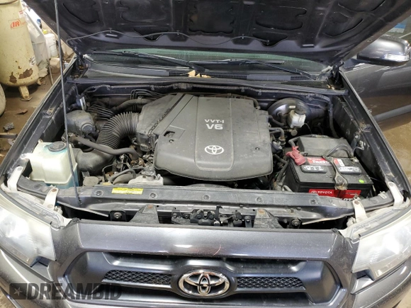 2014 Toyota Tacoma with VIN 5TFLU4ENXEX089927, listed as a Copart auction lot 52140565 with 112,924 mi miles and Salvage Title. Bid and sale history available at DreamBid. Image 11.