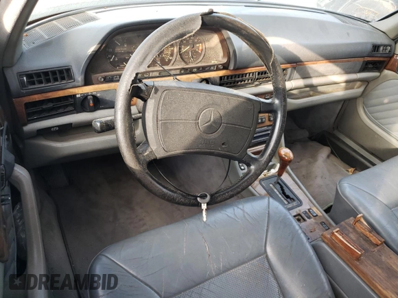 1990 Mercedes-Benz 560 with VIN WDBCA39E8LA508059, listed as a Copart auction lot 75865254 with 222,616 mi miles and Clean Title. Bid and sale history available at DreamBid. Image 8.