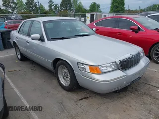 2001 Mercury Grand Marquis LS z VIN 2MEFM75W91X655747, wystawiony jako IAAI lot #42041090 z przebiegiem 138 906 mil mil oraz . Historia ofert i sprzedaży dostępna na DreamBid. Obrazek 1.