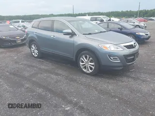 2012 Mazda CX-9 Grand Touring z VIN JM3TB3DV5C0361282, wystawiony jako IAAI lot #42538257 z przebiegiem 117 393 mil mil oraz . Historia ofert i sprzedaży dostępna na DreamBid. Obrazek 1.