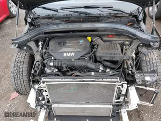 2018 BMW X1 xDrive28i with VIN WBXHT3C39J3H30531, listed as a IAAI auction lot 41890734 with 59,147 mi miles. Bid and sale history available at carsss.com. Image 10.
