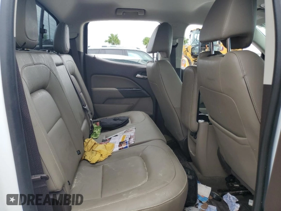 2017 GMC Canyon 2WD SLT z VIN 1GTG5DE13H1235684, wystawiony jako Copart lot #74739974 z przebiegiem Nie podano mil oraz Szkoda całkowita • Salvage title. Historia ofert i sprzedaży dostępna na DreamBid. Obrazek 10.