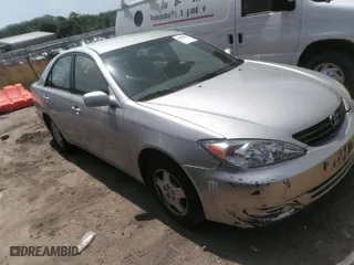 2003 Toyota Camry LE with VIN 4T1BF32K73U040558, listed as a IAAI auction lot 42092091 with 179,949 mi miles. Bid and sale history available at carsss.com. Image 1.