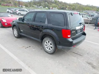 2008 Mazda Tribute Grand Touring with VIN 4F2CZ02Z48KM26109, listed as a IAAI auction lot 42011447 with 221,686 mi miles. Bid and sale history available at carsss.com. Image 3.