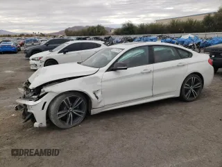 2015 BMW 4 Series 435i with VIN WBA4B1C54FG241520, listed as a Copart auction lot 82253054 with 85,348 mi miles and Salvage Title. Bid and sale history available at carsss.com. Image 1.