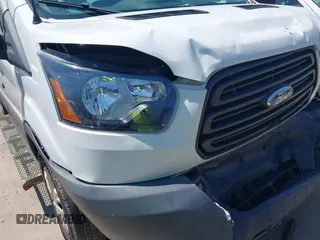 2018 Ford Transit XL z VIN 1FMZK1CM5JKB31481, wystawiony jako IAAI lot #42329280 z przebiegiem 57 051 mil mil oraz . Historia ofert i sprzedaży dostępna na DreamBid. Obrazek 18.