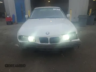 1997 BMW 3 Series 328is with VIN WBABG1326VET03587, listed as a Copart auction lot 41882135 with 231,287 mi miles and Salvage Title. Bid and sale history available at carsss.com. Image 5.
