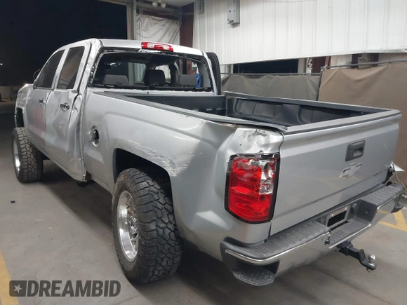 2018 Chevrolet Silverado 1500 LT with VIN 1GCVKREC1JZ151188, listed as a IAAI auction lot 42153618 with 82,391 mi miles and . Bid and sale history available at DreamBid. Image 3.