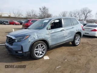 2024 Honda Passport EX-L with VIN 5FNYF8H54RB015972, listed as a IAAI auction lot 41904138 with 9,638 mi miles and . Bid and sale history available at DreamBid. Image 2.