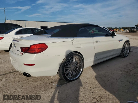2012 BMW 6 Series 650i z VIN WBALZ3C56CDL72058, wystawiony jako Copart lot #43246815 z przebiegiem 133 048 mil mil oraz Tytuł czysty. Historia ofert i sprzedaży dostępna na DreamBid. Obrazek 3.