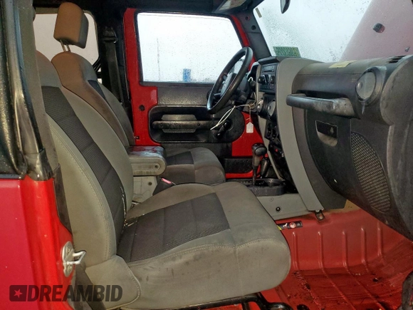 2008 Jeep Wrangler X z VIN 1J4FA24188L650933, wystawiony jako Copart lot #60603225 z przebiegiem 121 682 mil mil oraz Szkoda całkowita • Salvage title. Historia ofert i sprzedaży dostępna na DreamBid. Obrazek 10.
