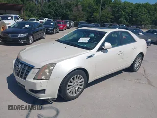2012 Cadillac CTS Luxury with VIN 1G6DF5E50C0131857, listed as a IAAI auction lot 42610389 with 85,896 mi miles and . Bid and sale history available at DreamBid. Image 2.