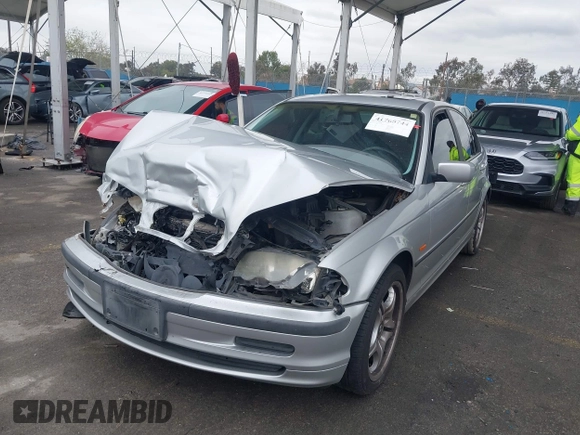 2000 BMW 3 Series 323i with VIN WBAAM3341YCA87796, listed as a IAAI auction lot 41765744 with 169,051 mi miles. Bid and sale history available at carsss.com. Image 2.