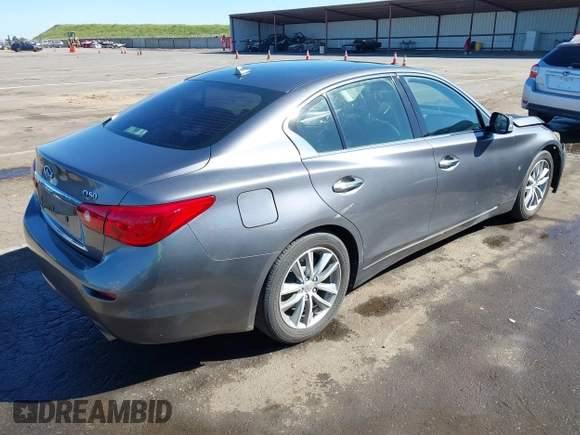 2014 Infiniti Q50 with VIN JN1BV7AP0EM682444, listed as a IAAI auction lot 41857312 with 140,765 mi miles. Bid and sale history available at carsss.com. Image 4.