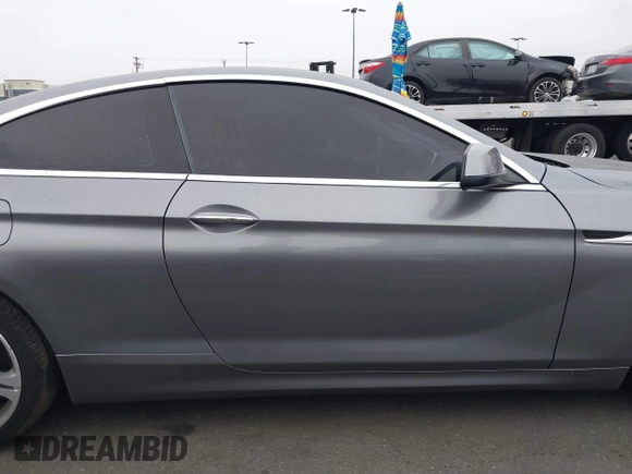 2013 BMW 6 Series 650i with VIN WBAYM9C53DDW20145, listed as a IAAI auction lot 42039618 with 66,684 mi miles and . Bid and sale history available at carsss.com. Image 13.