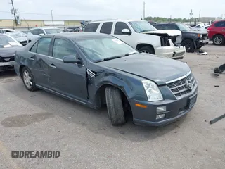 2011 Cadillac STS RWD z VIN 1G6DW6EDXB0108470, wystawiony jako IAAI lot #41949803 z przebiegiem 123 986 mil mil oraz . Historia ofert i sprzedaży dostępna na DreamBid. Obrazek 1.